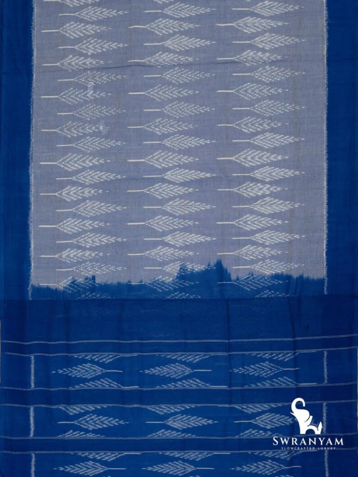 Flat lay of sky blue Pochampally ikat cotton saree with leaf motif body and royal blue striped ikat pallu