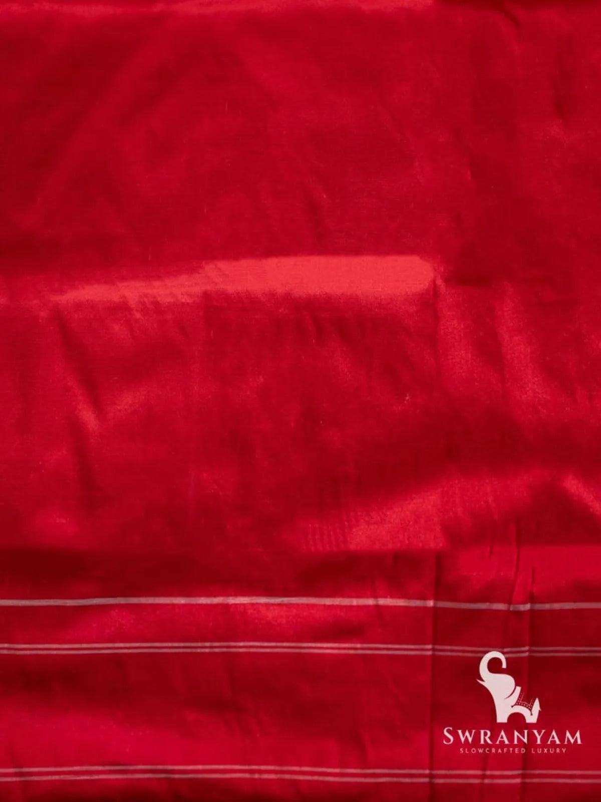 Plain red silk fabric with thin silver stripes at the edge, matching piece for the red and olive Telia Rumal saree