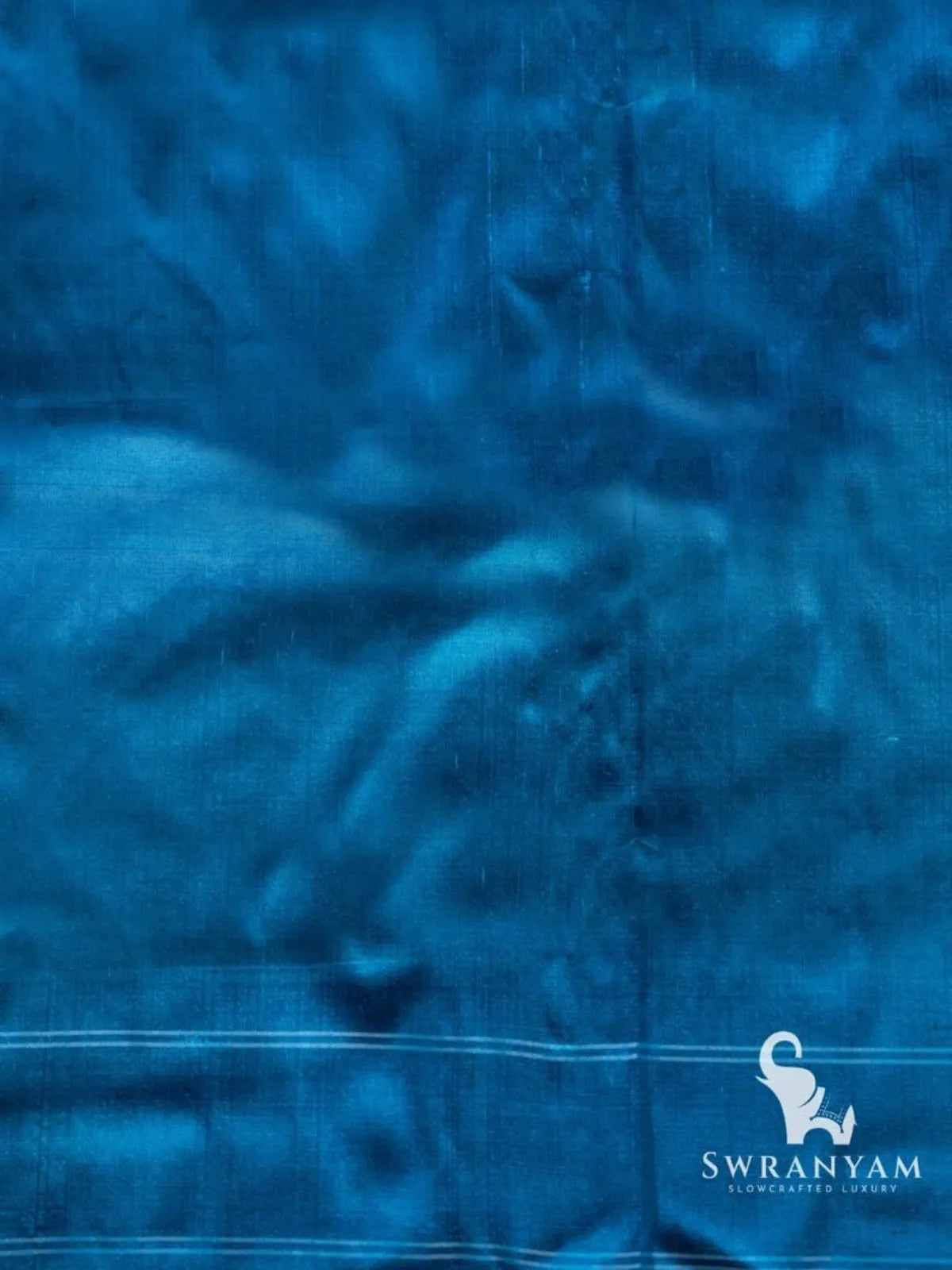 Plain blue silk fabric with thin white stripes, matching piece for the blue and green Telia Rumal double ikat saree