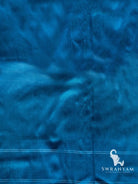 Plain blue silk fabric with thin white stripes, matching piece for the blue and green Telia Rumal double ikat saree