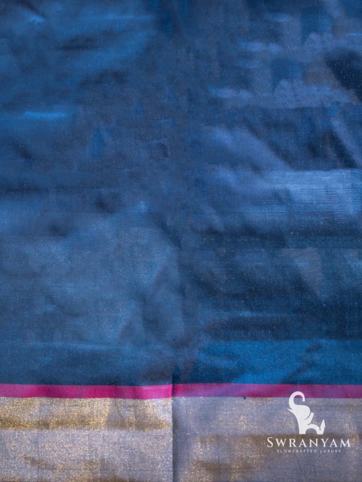 Indigo blue silk fabric with pink edging and gold zari band, matching piece for the indigo blue Pochampally ikat saree