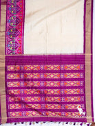 Ivory Pochampally ikat silk saree spread flat with peacock ikat border and purple pallu with diamond ikat panels