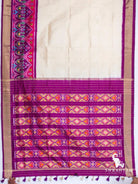 Full view of ivory silk saree with plain body, peacock ikat border and zari-striped purple ikat pallu