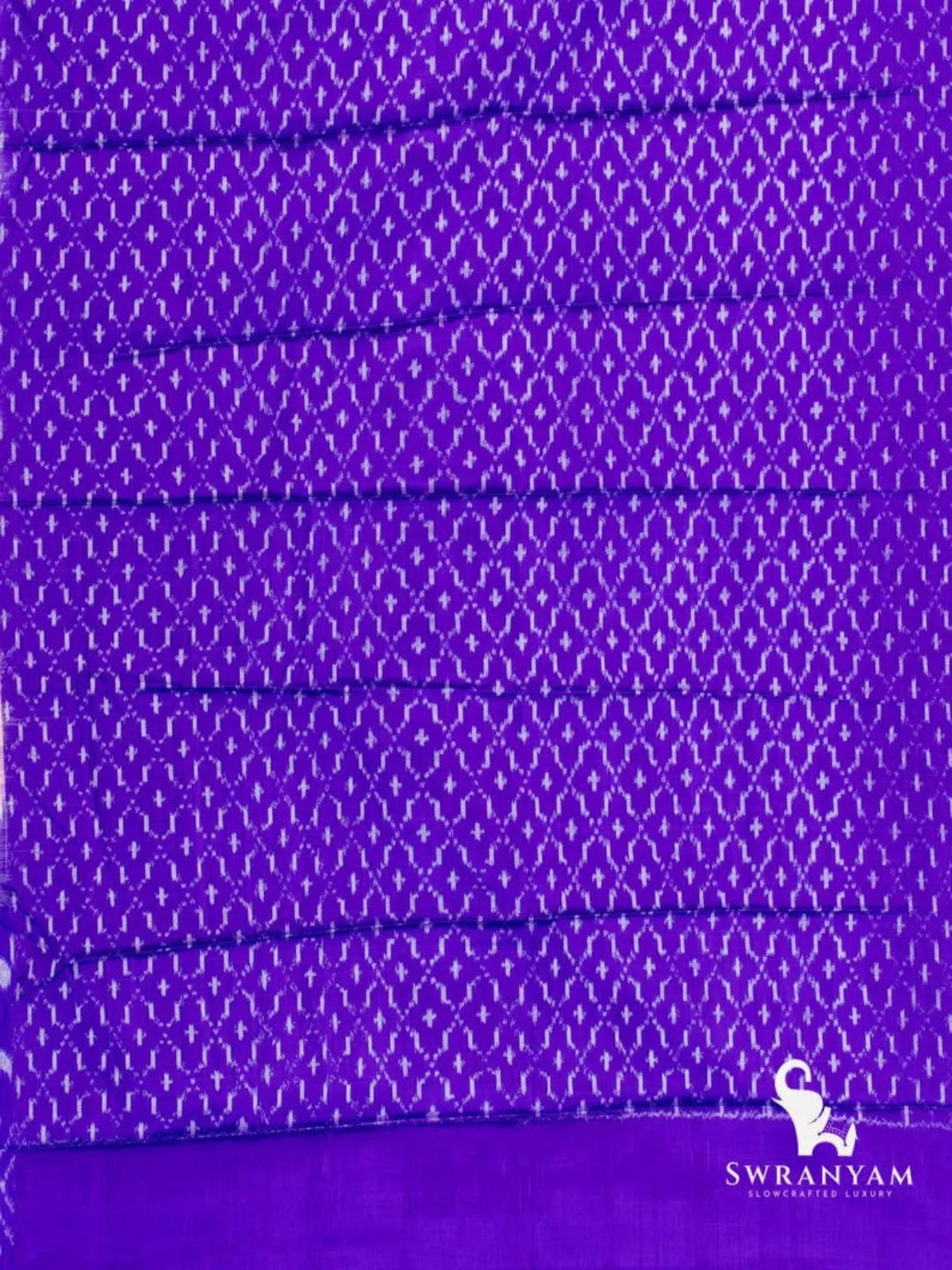 Royal purple silk fabric with all-over small white ikat motifs, matching piece for the purple and peach tussar saree
