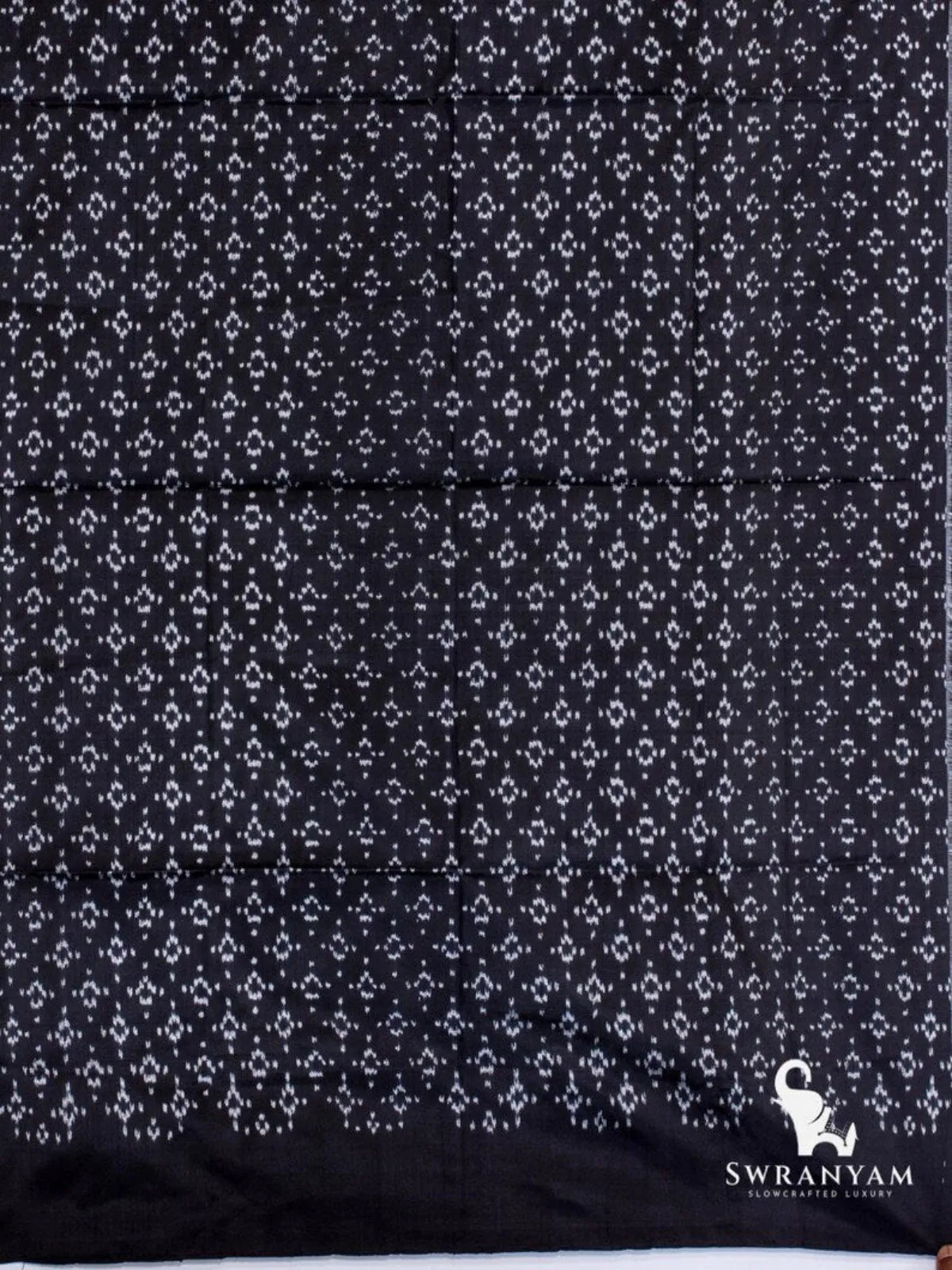 Black ikat silk fabric with small white diamond ikat motifs, matching piece for charcoal grey tussar silk saree