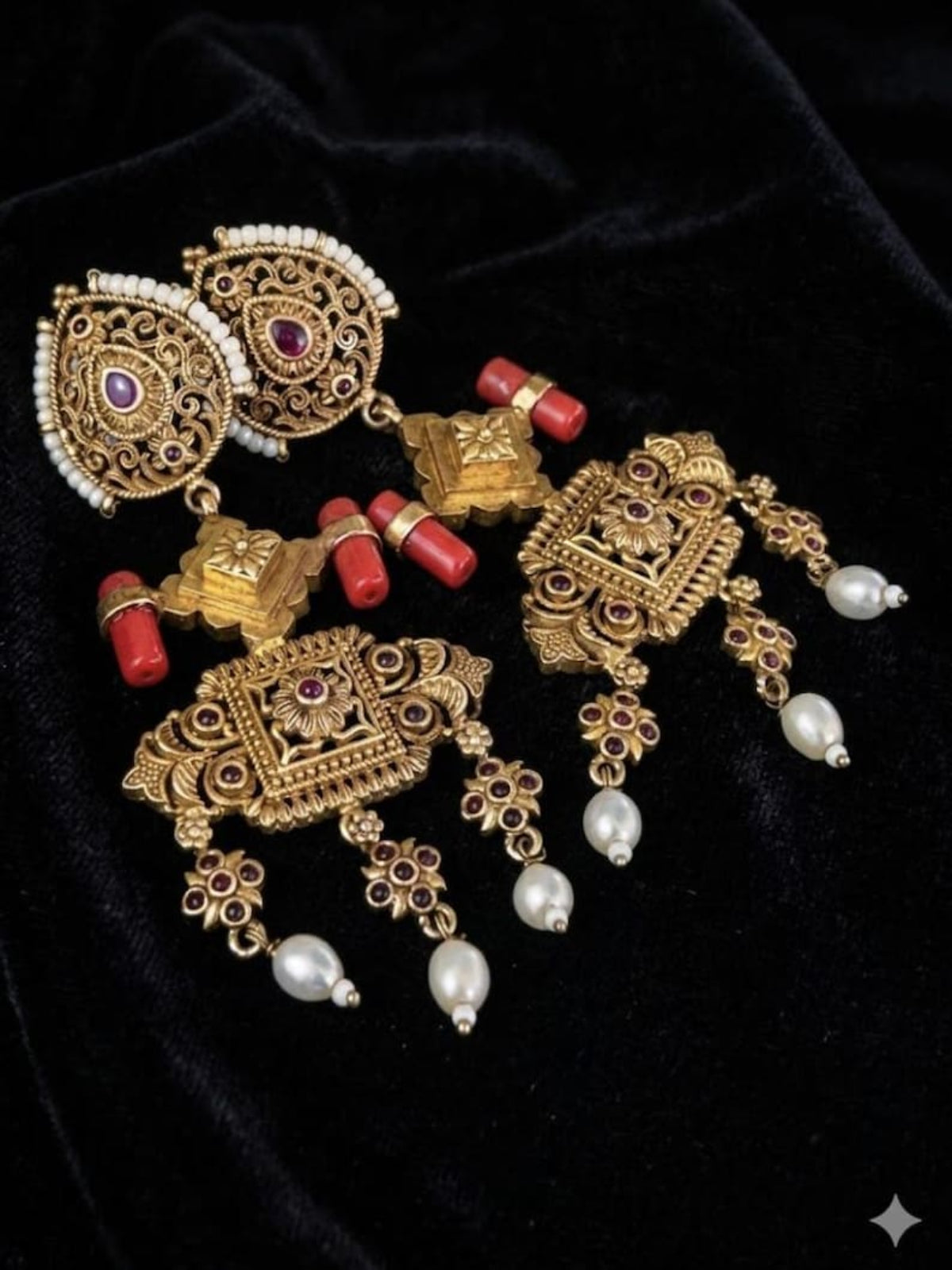 Swranyam antique carved silver chandelier earrings with coral beads, side angle